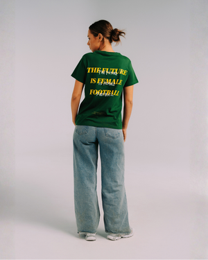 Model wearing the back of the green Her Era Statement by KS Label
