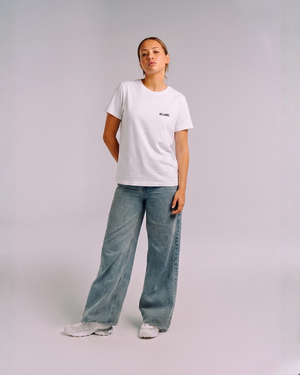 Model wearing her era essential white ks label