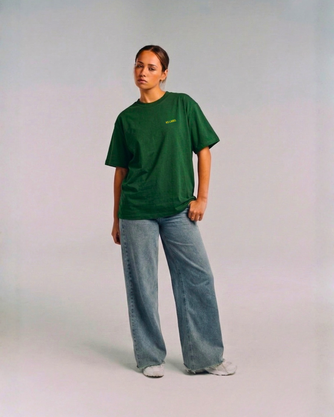 Model wearing Her Era Oversized Green Tee by KS Label