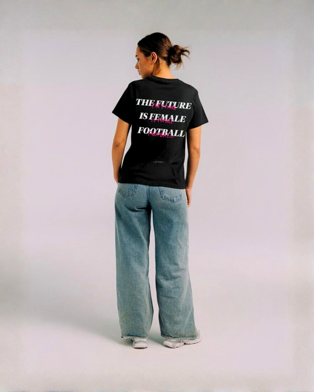 Model wearing the back of the black Her Era Essential by KS Label