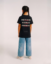 Model wearing the back of the black Her Era Essential Youth tee by KS Label
